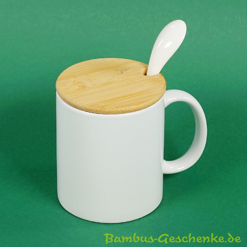 Kaffeebecher mit Bambusdeckel und Löffel